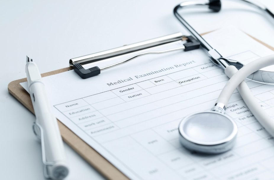 paperwork and medical tools